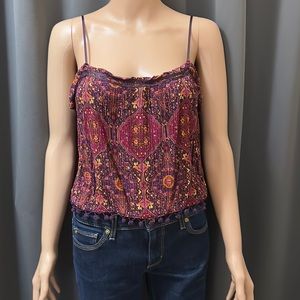 Beautiful Boho Me to We Floral Cami Top With Pom Pom Hem and Ribbon Straps.